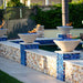 The Outdoor Plus Cazo Concrete Fire Bowls in Vanilla, lifestyle