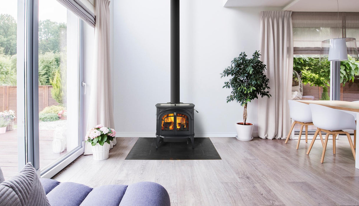 Vermont Castings Dauntless wood stove in Twilight enamel in a living room