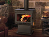Iron Strike Tahoma 1600 Wood Stove burning in a stone hearth room